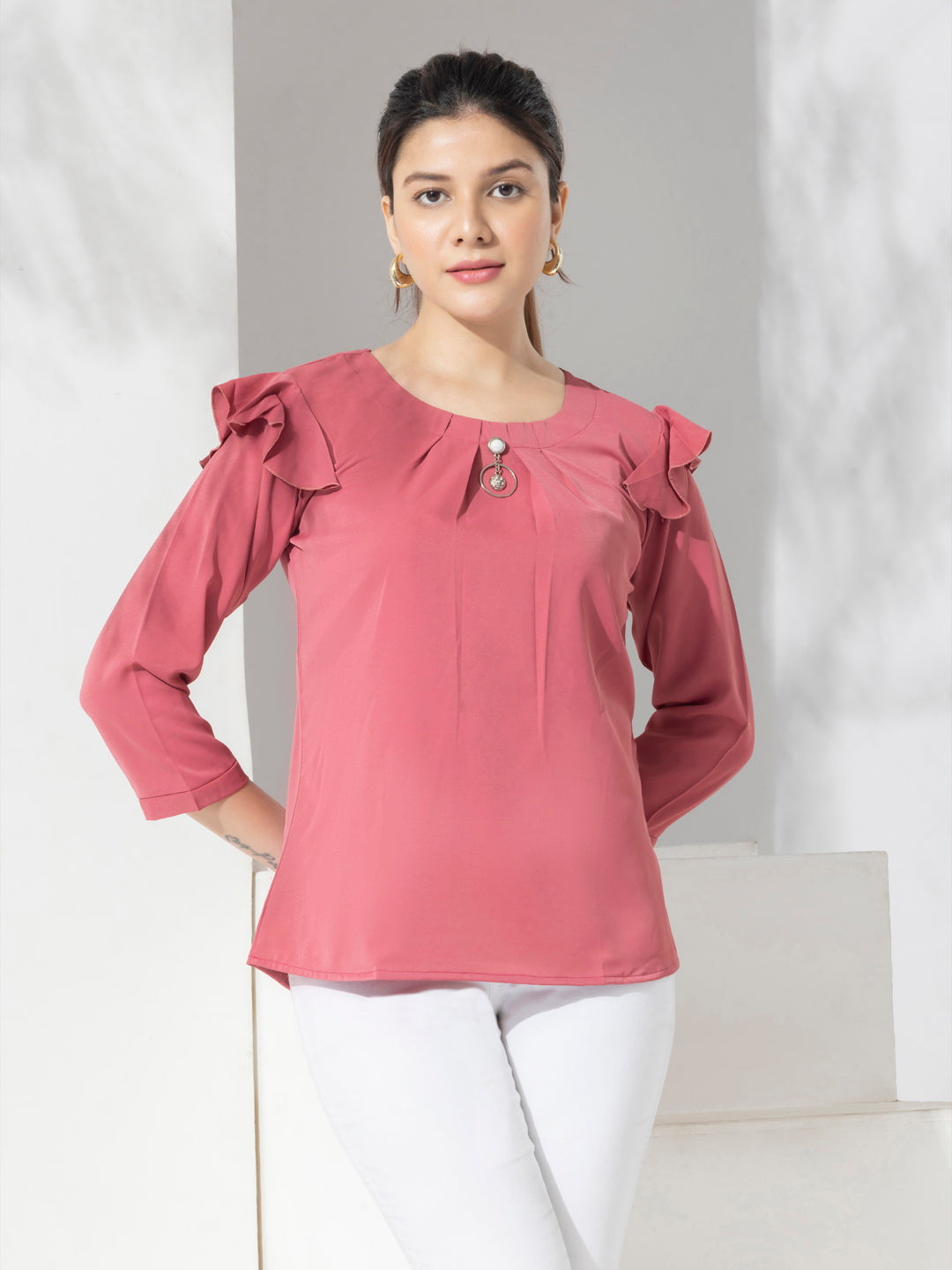 Fashion Top With Puff Sleeves & Metal Emblishment